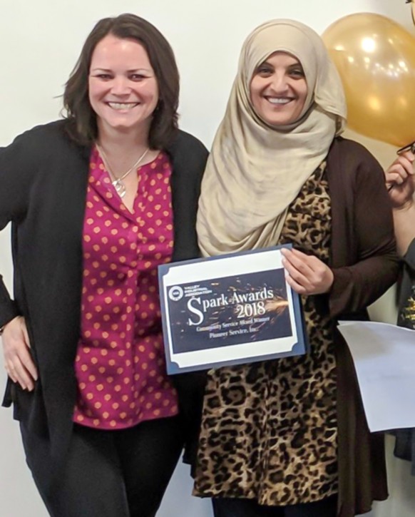 Kathy Gilmore, President of VIA and dear friend, presents Aneesa with the Spark Community Outreach Award (2018)